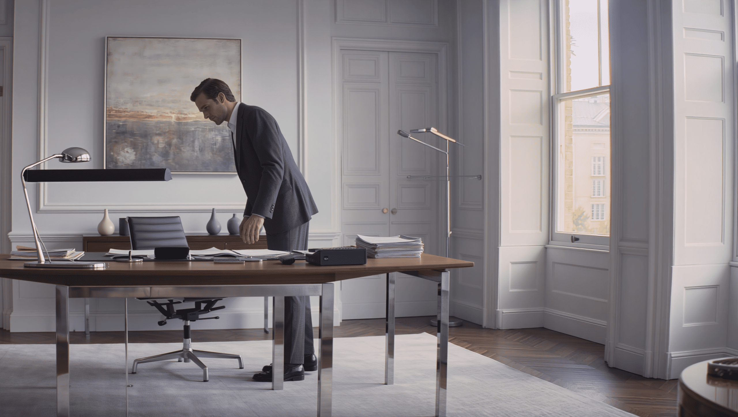 Butler arranging a desk